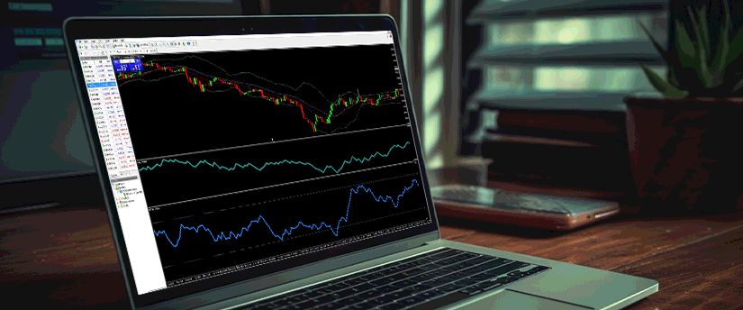 Laptop displaying MT4 indicators, including charts, trend tools and technical analysis on the MetaTrader 4 platform