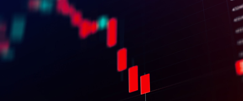 A stock market chart featuring red and blue bars, representing varying trends and changes in stock values.
