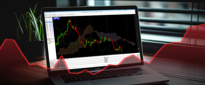 Um portátil exibe gráficos de trading em forex, com um trader a monitorizar ativamente o mercado em busca de oportunidades de investimento.